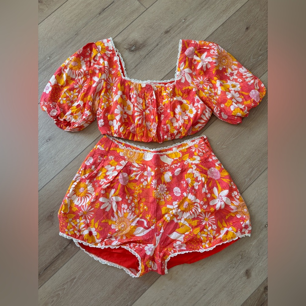 Vici Bahama Breeze Puff Sleeve Crop Top and Pocketed High Rise Floral Shorts